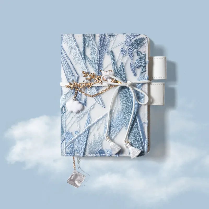 Simple Girl glacier embroidery fabric notebook in A6 and A5 sizes with grid pages.