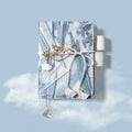 Simple Girl glacier embroidery fabric notebook in A6 and A5 sizes with grid pages.
