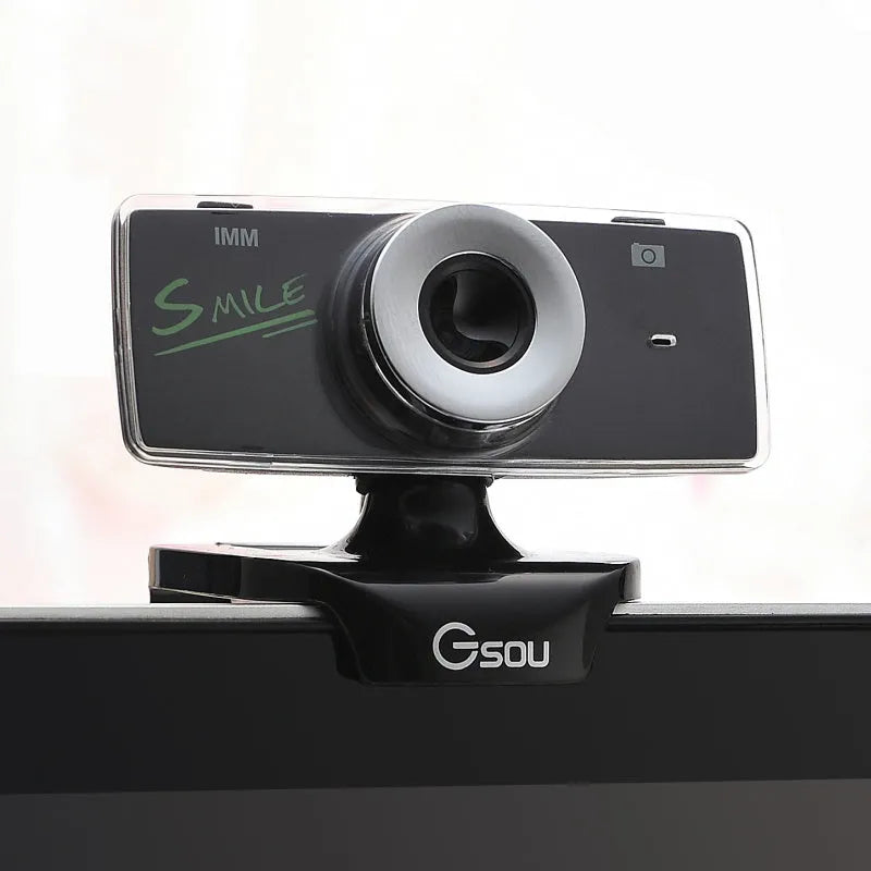 Black USB high definition webcam for desktop and laptop computers on a white background.