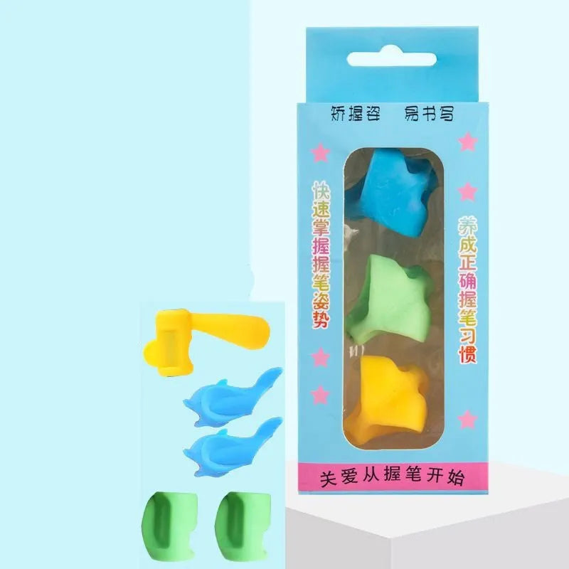 Children's silicone pencil grip corrector in assorted colours showing three-finger moulded design