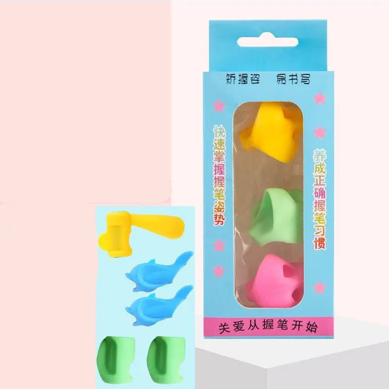 Children's silicone pencil grip corrector in assorted colours showing three-finger moulded design