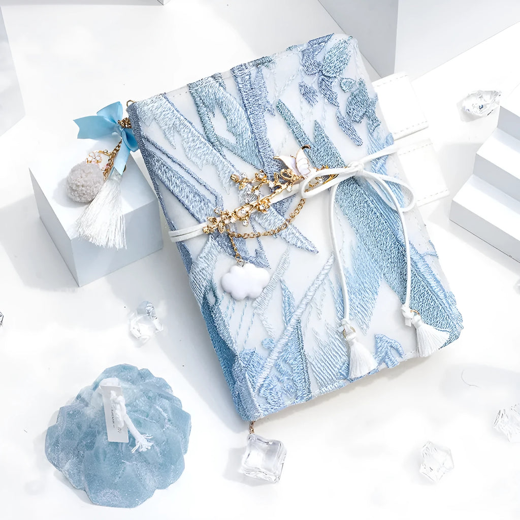Simple Girl glacier embroidery fabric notebook in A6 and A5 sizes with grid pages.
