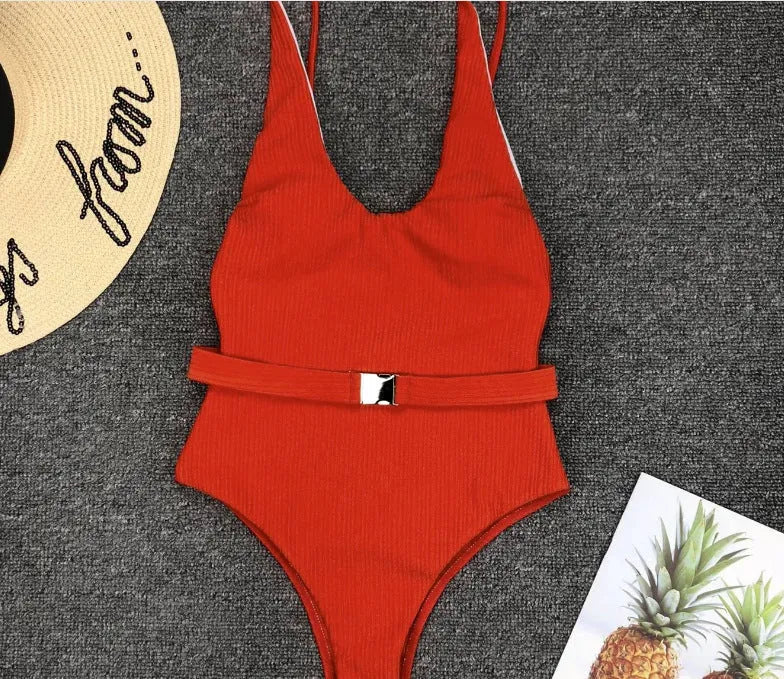 Women's one-piece solid colour polyester swimsuit with front belt buckle, available in six colours, sizes S, M, L.