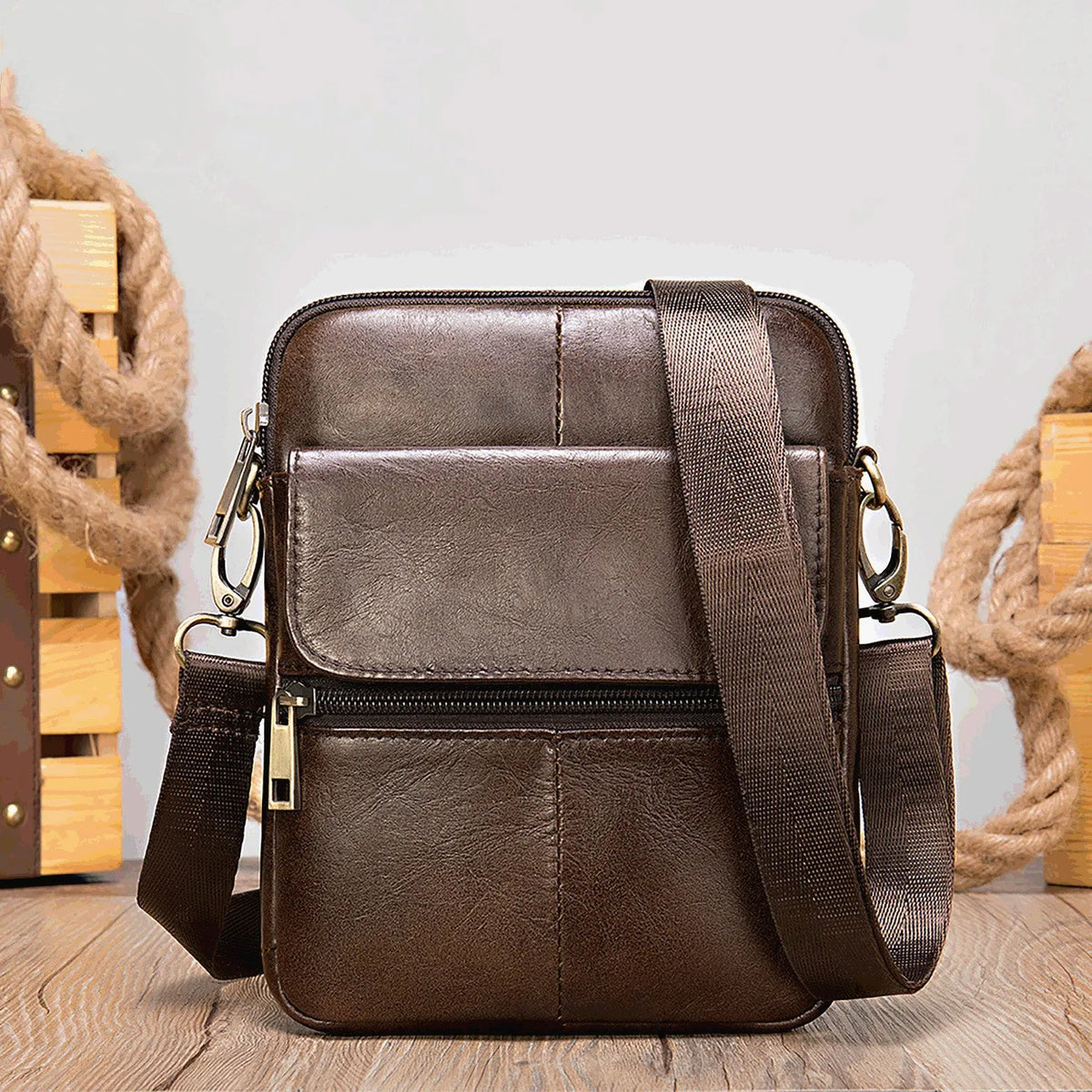 Men's first layer cowhide small square waist bag with zip opening and shoulder strap