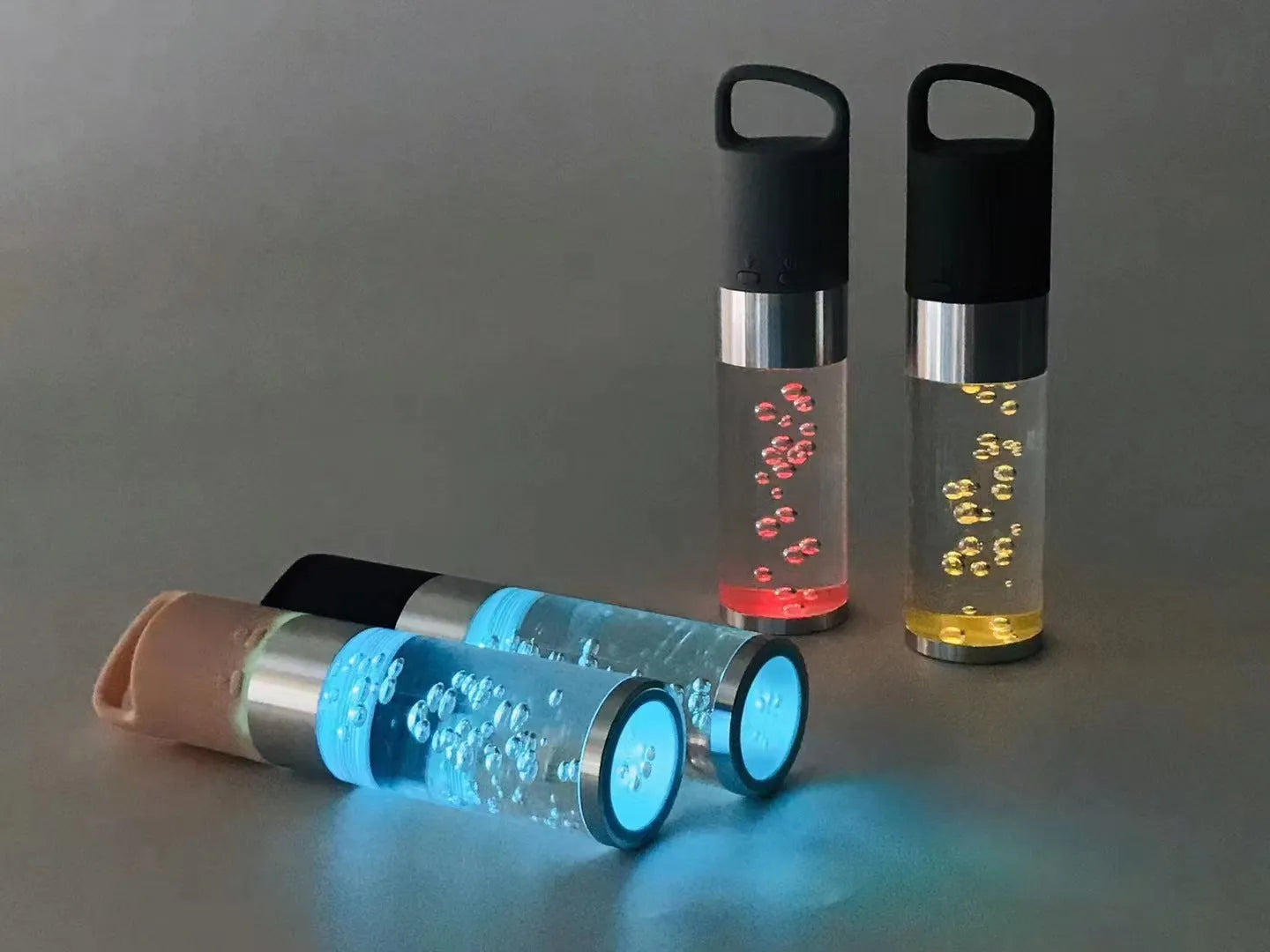 Colourful cartoon-design Bluetooth speaker with crystal lights in pink, black, silver grey, or green.