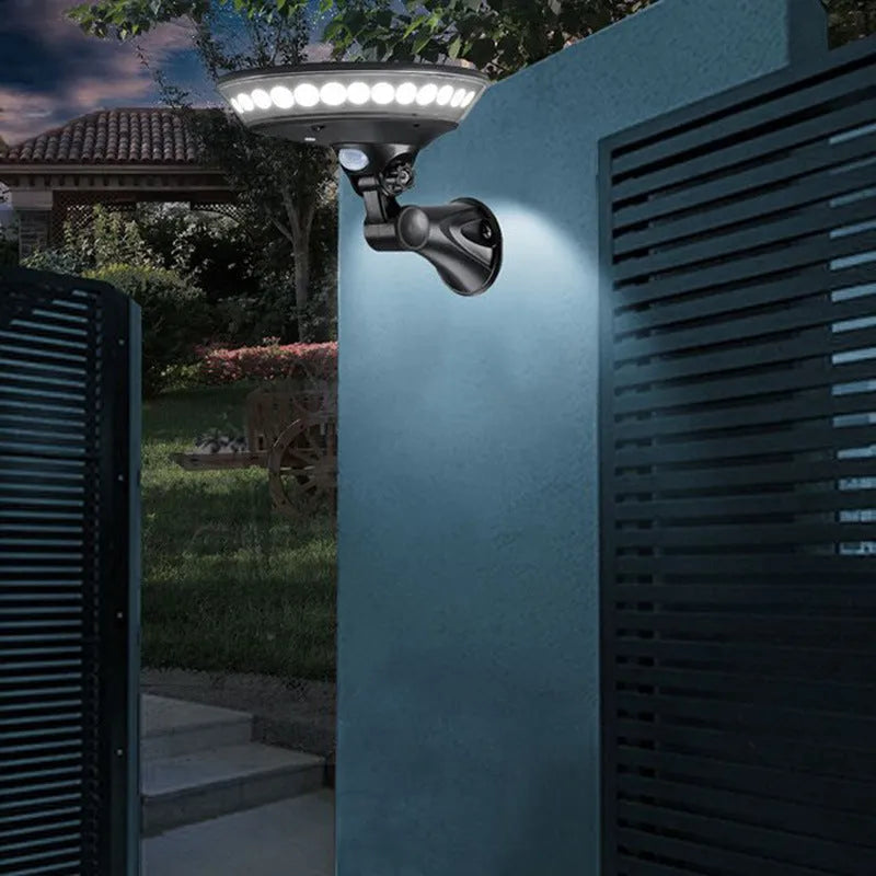 Solar-powered 360-degree outdoor security light with motion sensor on white background.