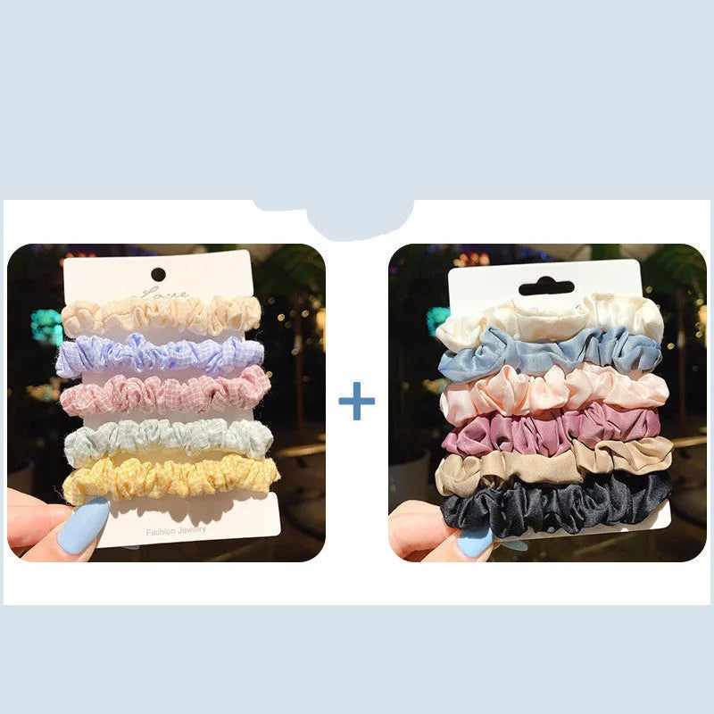 Assortment of children's small intestine hair rings and a large intestine head rope in autumn colours.