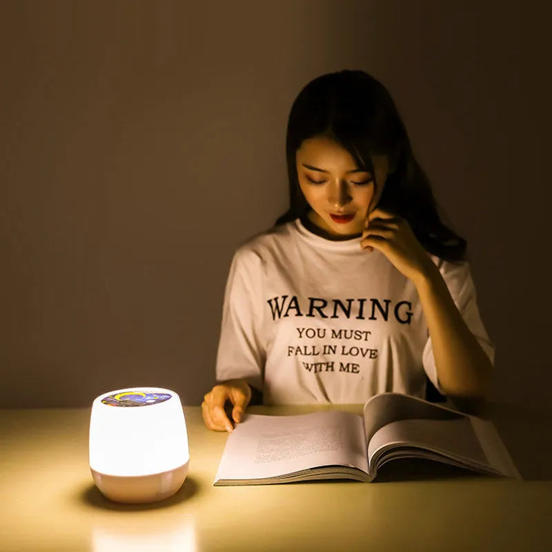 Pruixin rotating star projector night light showing star pattern projection on a wall.