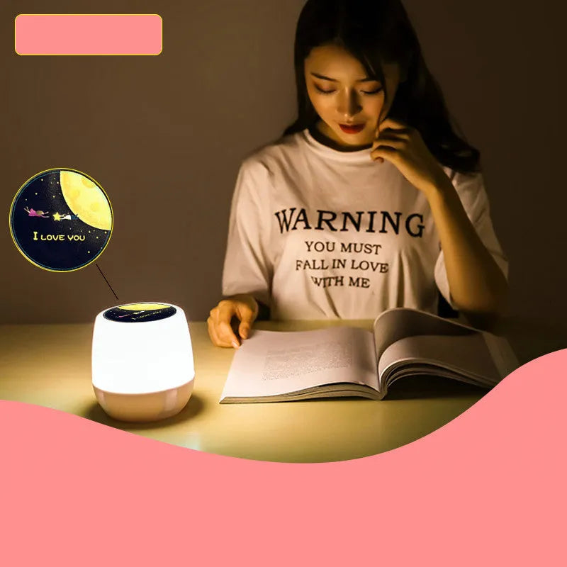 Pruixin rotating star projector night light showing star pattern projection on a wall.