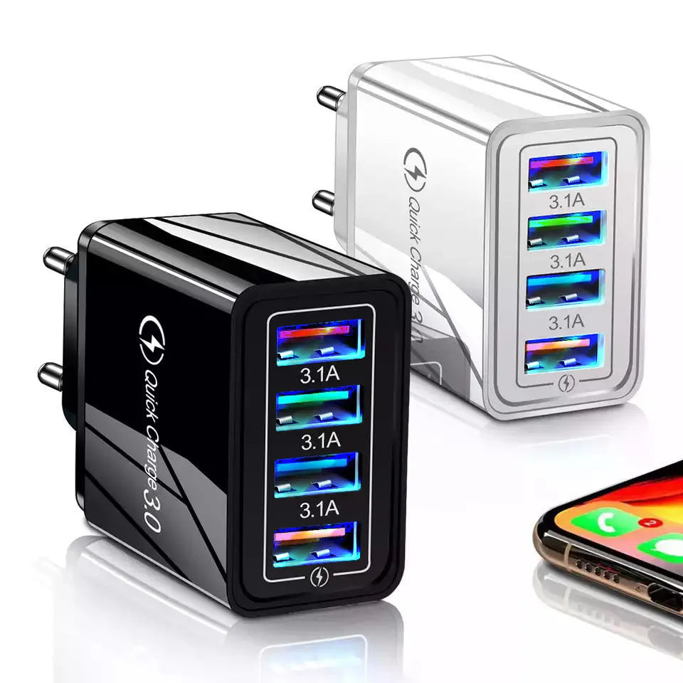 Simple Luminous compact 4-port USB wall charger with UK plug and blue luminous power indicator light on.