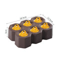 Soft plastic cartoon-style ice cube mould in brown and navy blue, showing honeycomb and rectangle shape options.