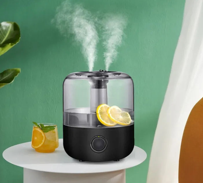 White or black ultrasonic humidifier with 3-litre tank and mechanical controls.