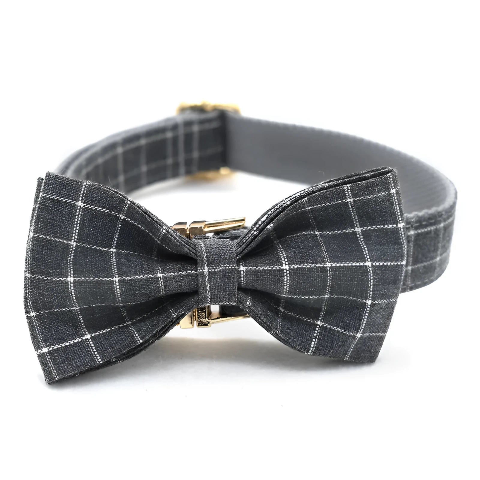 Grey plaid nylon dog collar with golden metal button on a white background, size M shown