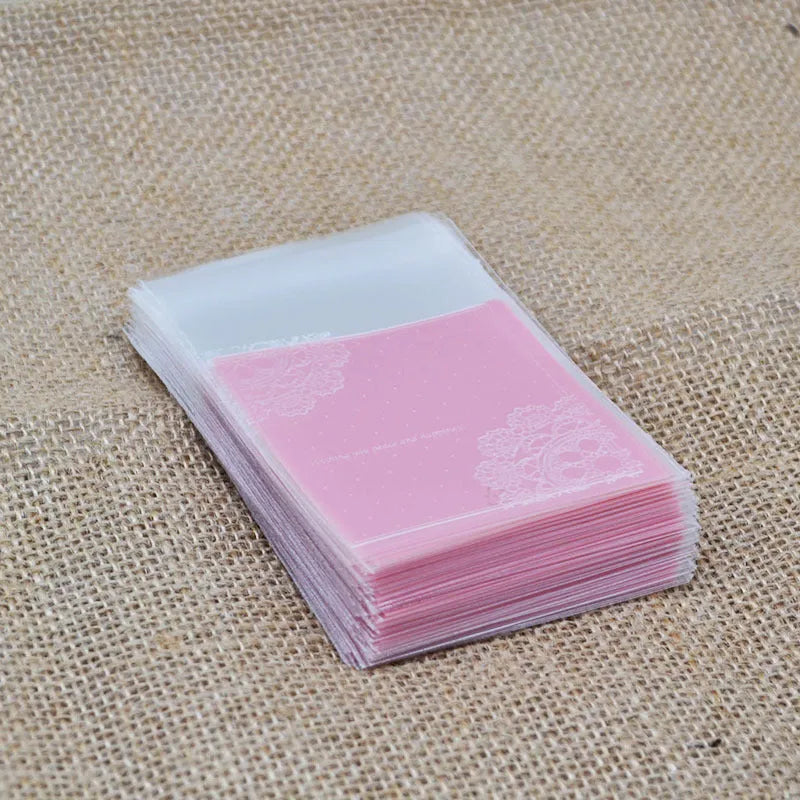 Pink self-adhesive plastic bag with gusseted base for packaging handmade soap