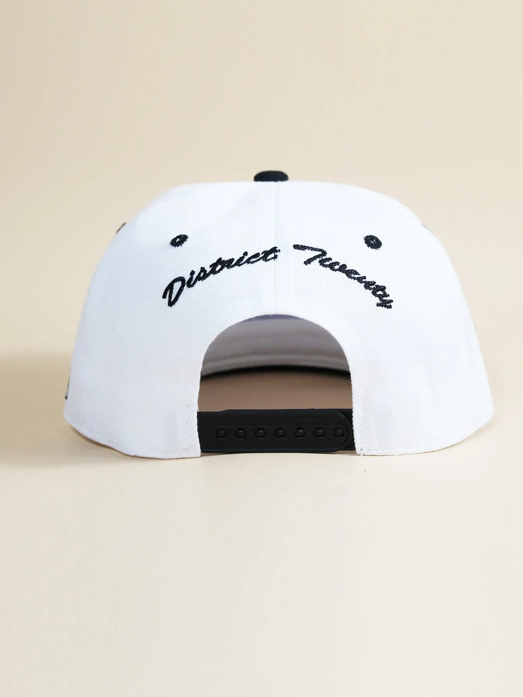 Adjustable unisex baseball cap with letter design, shown in all black, black, camouflage and white