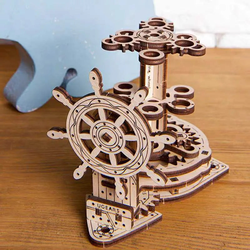 Ukrainian wooden rotating steering wheel model pen holder made of beech wood on a desk