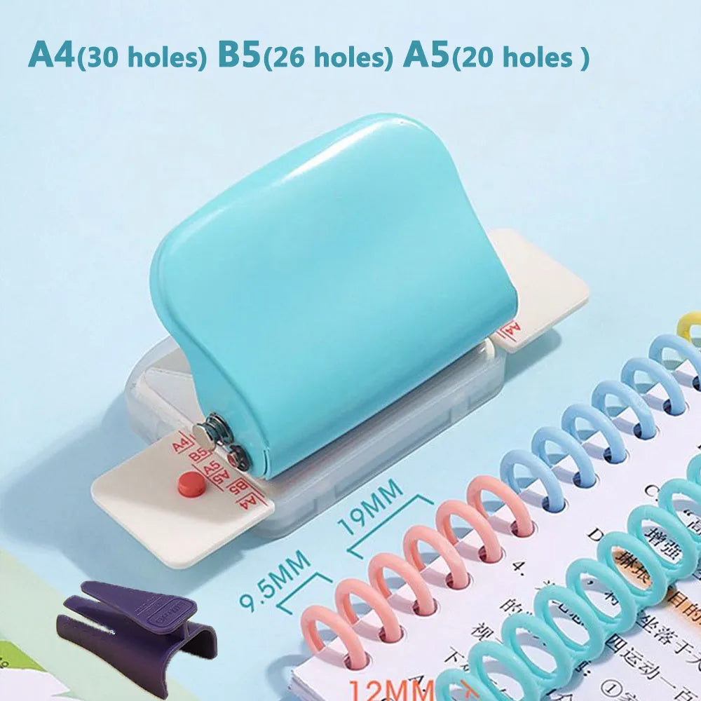 A4 manual punch and binder in sky blue with dimensions 120x55x65mm on a desk