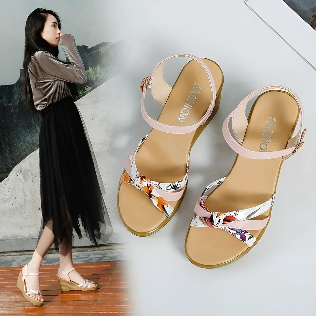 Women's pink wedge sandals with a thick 5cm heel, fish-mouth open toe, and a single adjustable buckle strap.