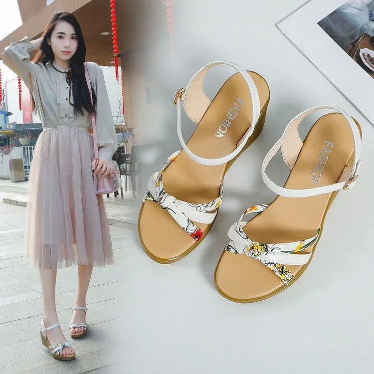 Women's pink wedge sandals with a thick 5cm heel, fish-mouth open toe, and a single adjustable buckle strap.
