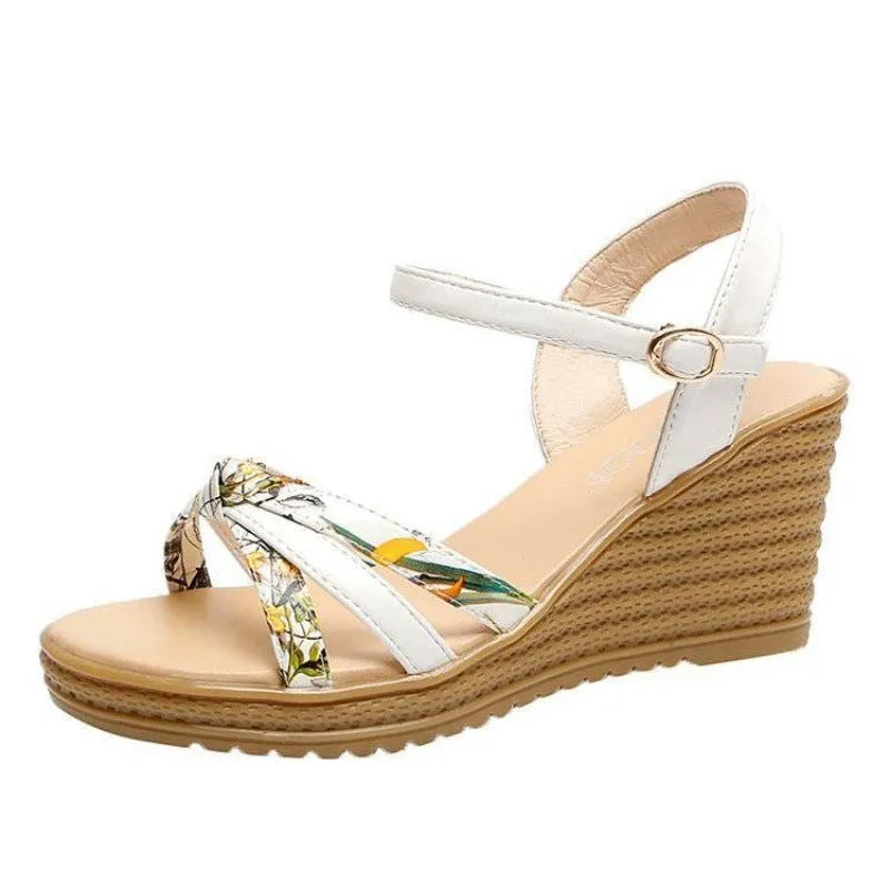 Women's pink wedge sandals with a thick 5cm heel, fish-mouth open toe, and a single adjustable buckle strap.