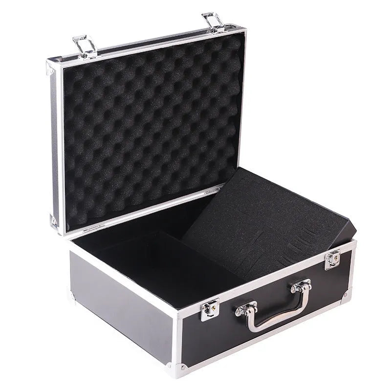 Black aluminium tattoo equipment storage case open, showing foam-lined interior with acrylic dividers organising pliers and machines.