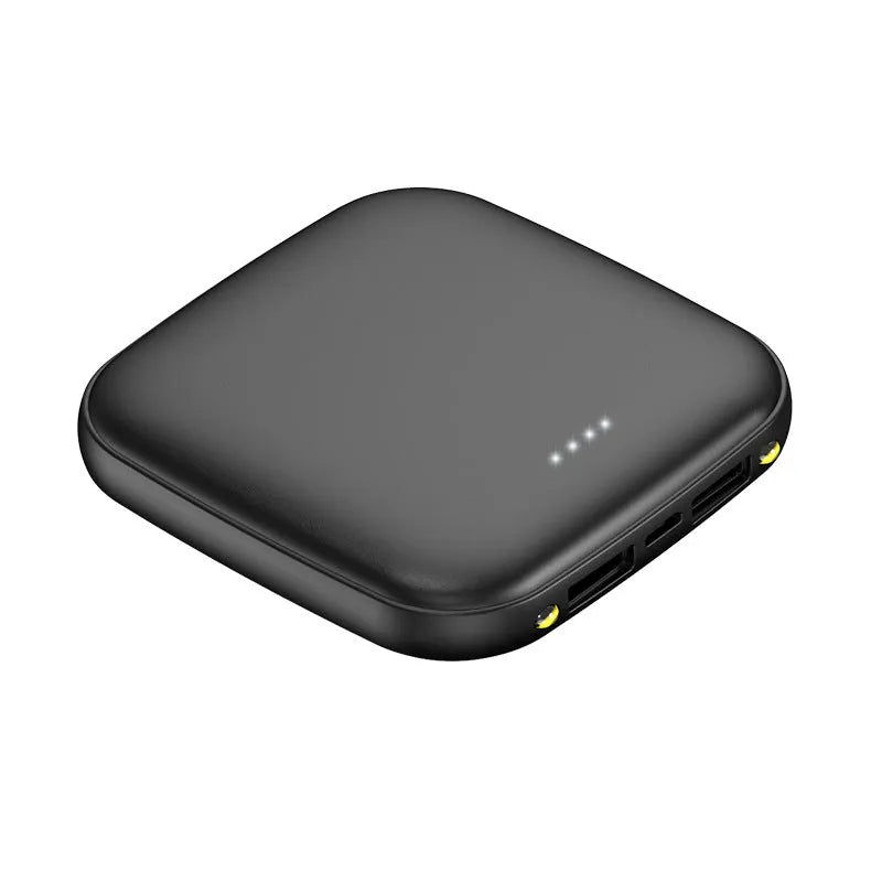 Mini black plastic power bank with an LED flashlight, showing scale against a hand.