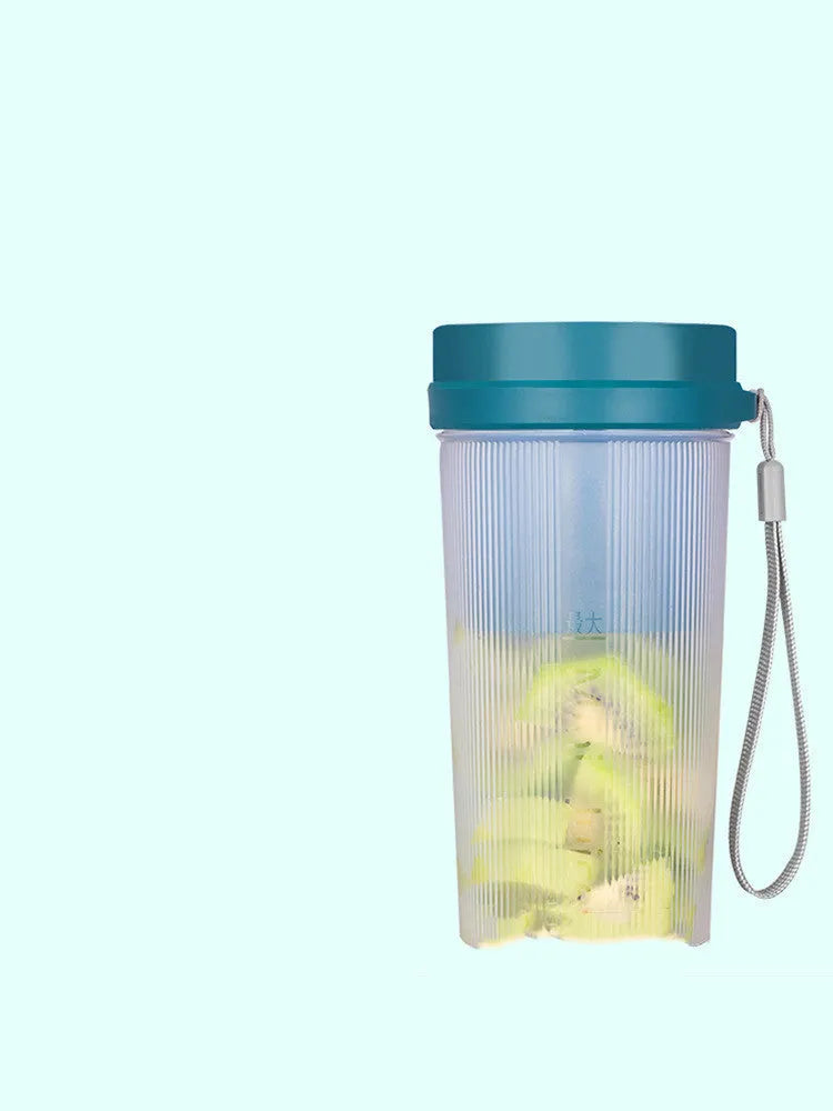 Portable electric juicer cup in pink or green with USB charging cable and pulp residue box.