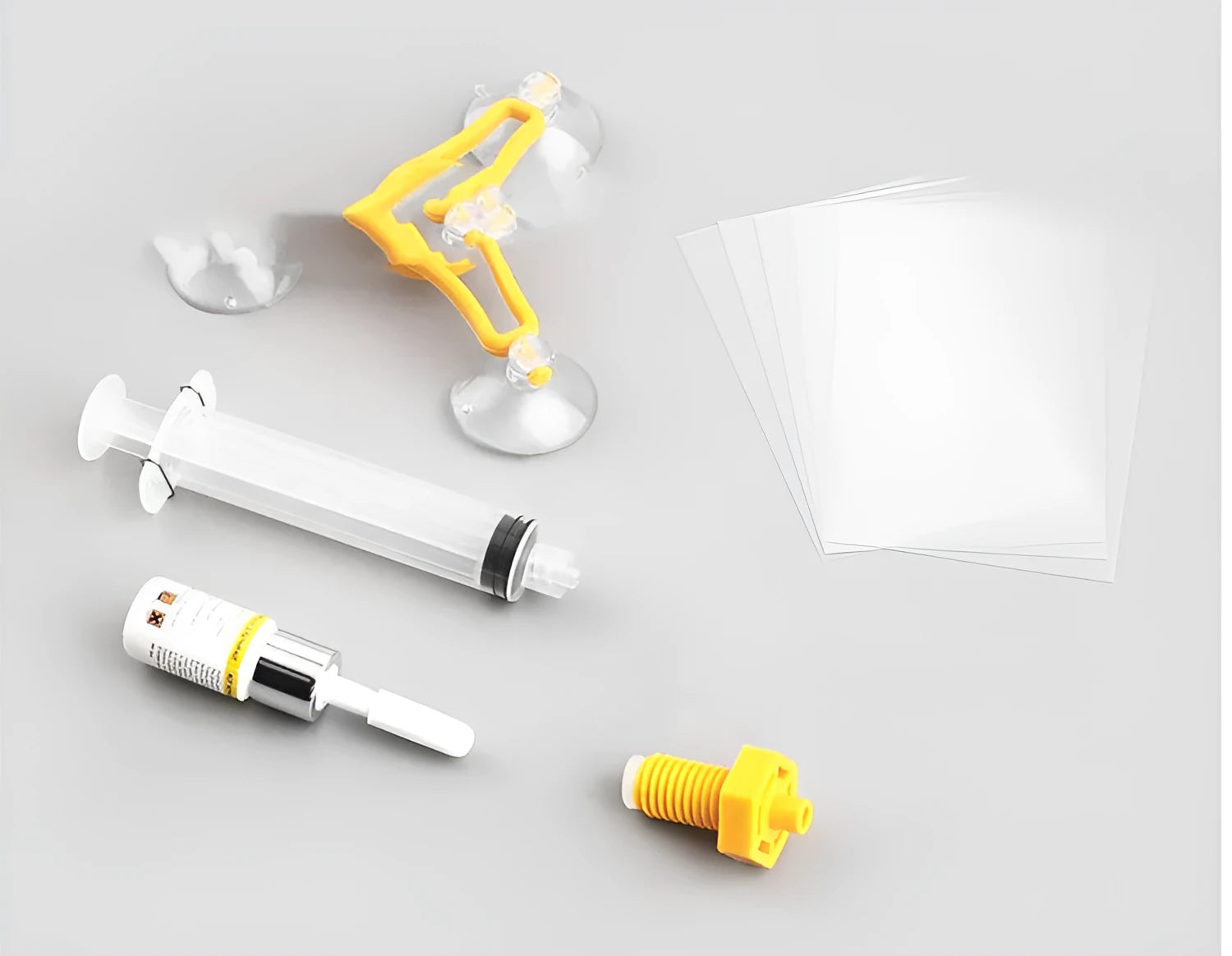 Yellow plastic triangle bracket auto glass repair tool with 2ml fluid for windshield chips and scratches