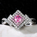 Cross-wound pink zircon ring in copper alloy with geometric modelling, ladies' simple style, sizes 6 to 10.