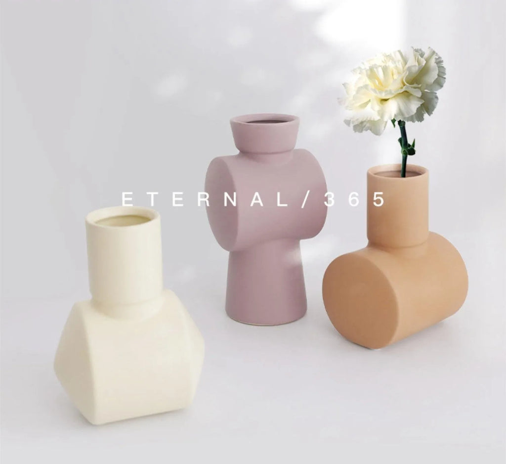 Nordic Morandi style hammer-shaped ceramic vase with colour glaze in beige, brown, or purple.