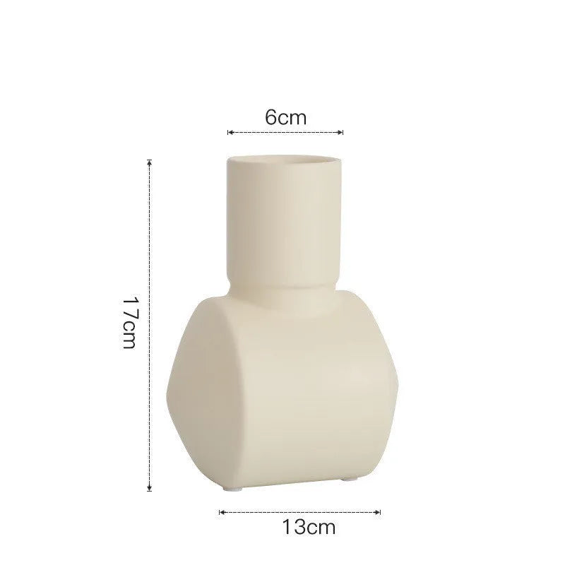 Nordic Morandi style ceramic vase with hammered texture in beige, brown, or purple.