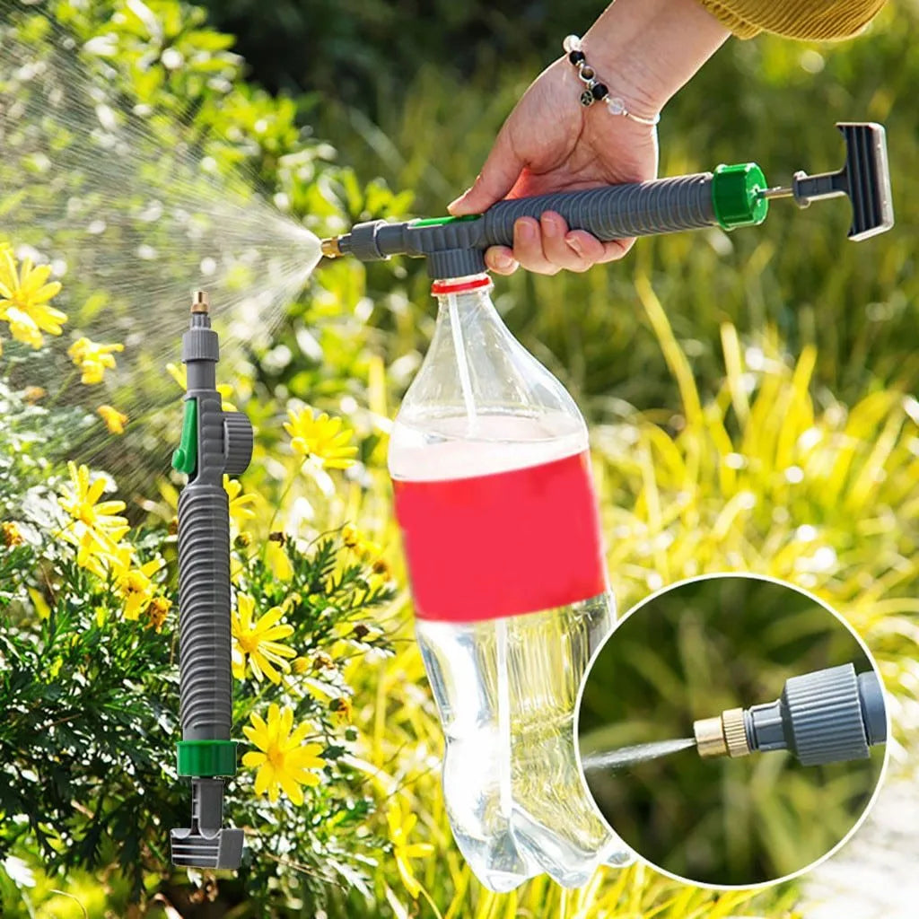 Grey watering sprayer nozzle attached to plastic bottle with 30cm connecting tube for garden watering