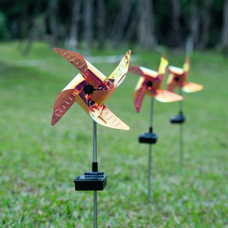 Solar windmill garden light with 32 LEDs, rotating windmill design and built-in solar panel for outdoor decoration