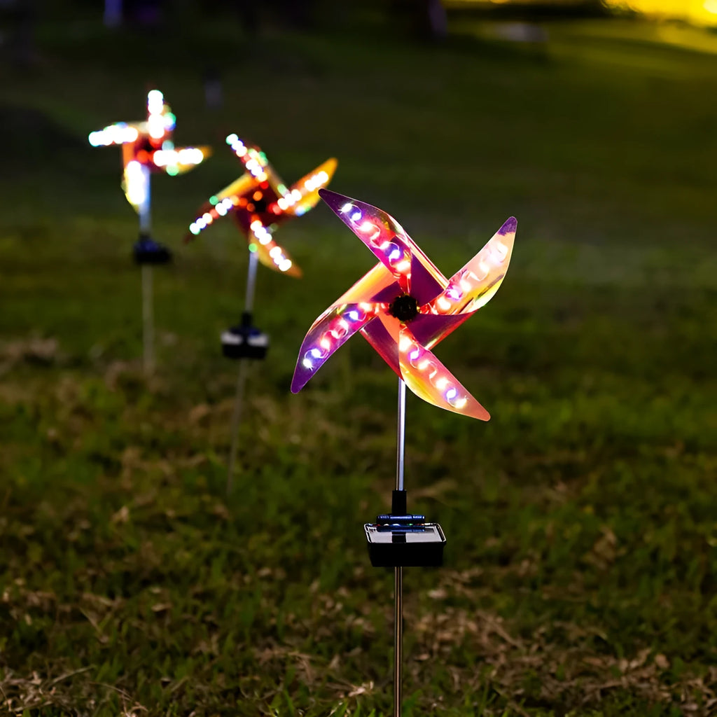 Solar windmill garden light with 32 LEDs, rotating windmill design and built-in solar panel for outdoor decoration