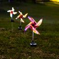 Solar windmill garden light with 32 LEDs, rotating windmill design and built-in solar panel for outdoor decoration