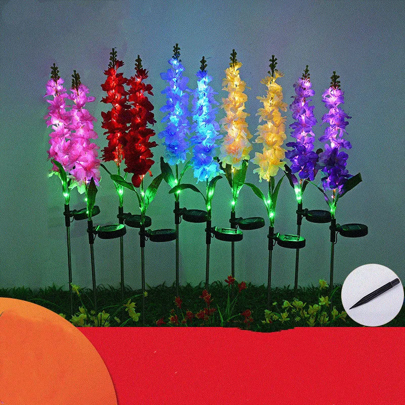 Solar LED violet lawn light with ABS housing and stainless steel pole for outdoor garden use