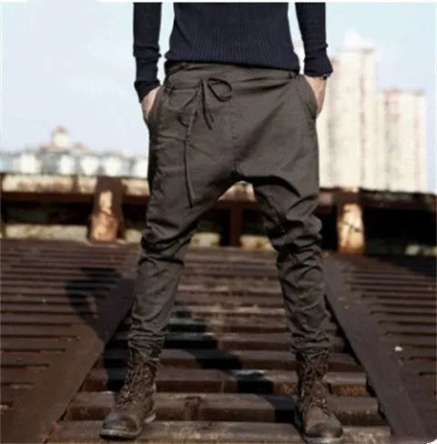 Men's black jogger sweatpants with loose fit and tapered leg design