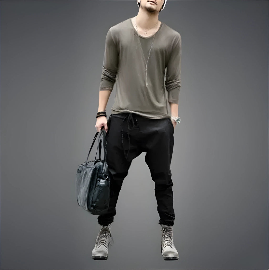 Men's black jogger sweatpants with loose fit and tapered leg design