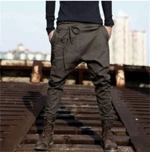 Men's black jogger sweatpants with loose fit and tapered leg design