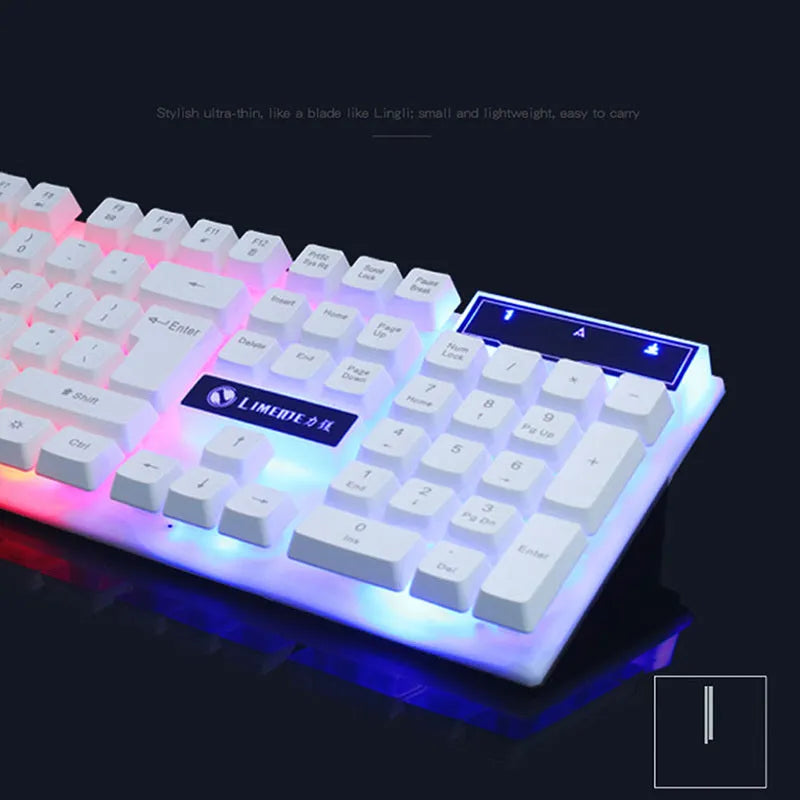 GTX300 black and white wired gaming keyboard and mouse set with backlit keys on a desk.