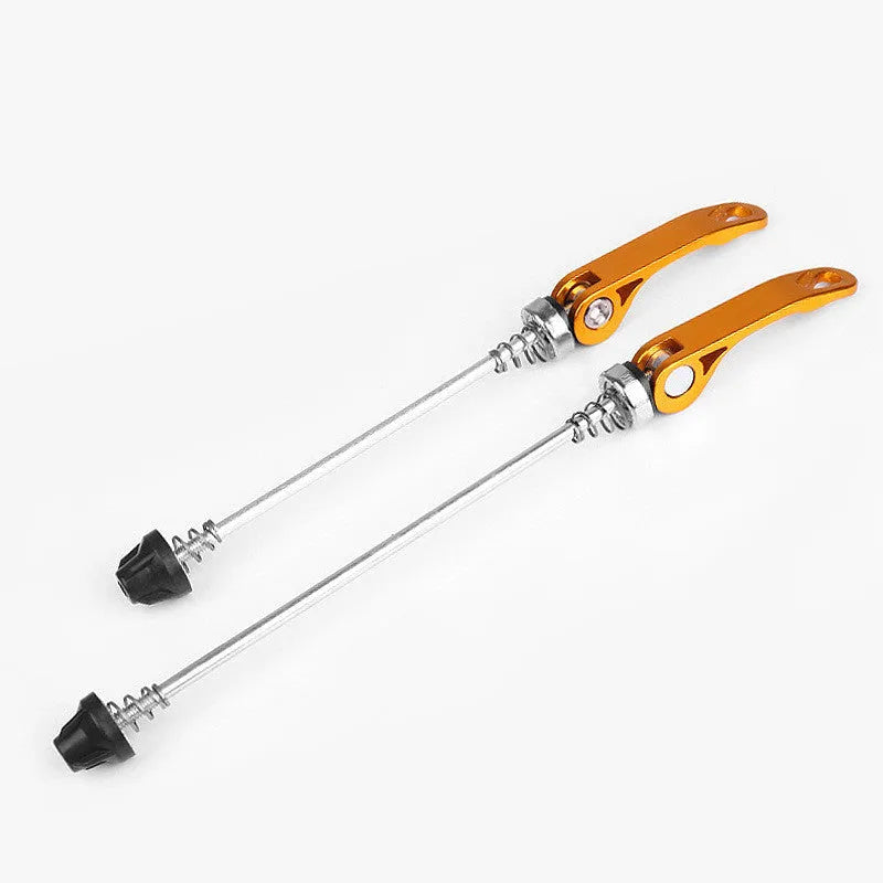 Bicycle quick release lever in assorted colours on a grey background.