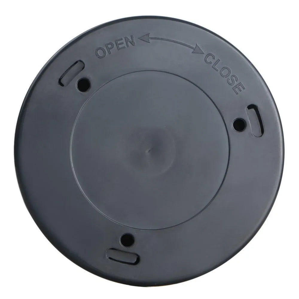 Silver coloured circular wireless motion sensor night light on a wall.