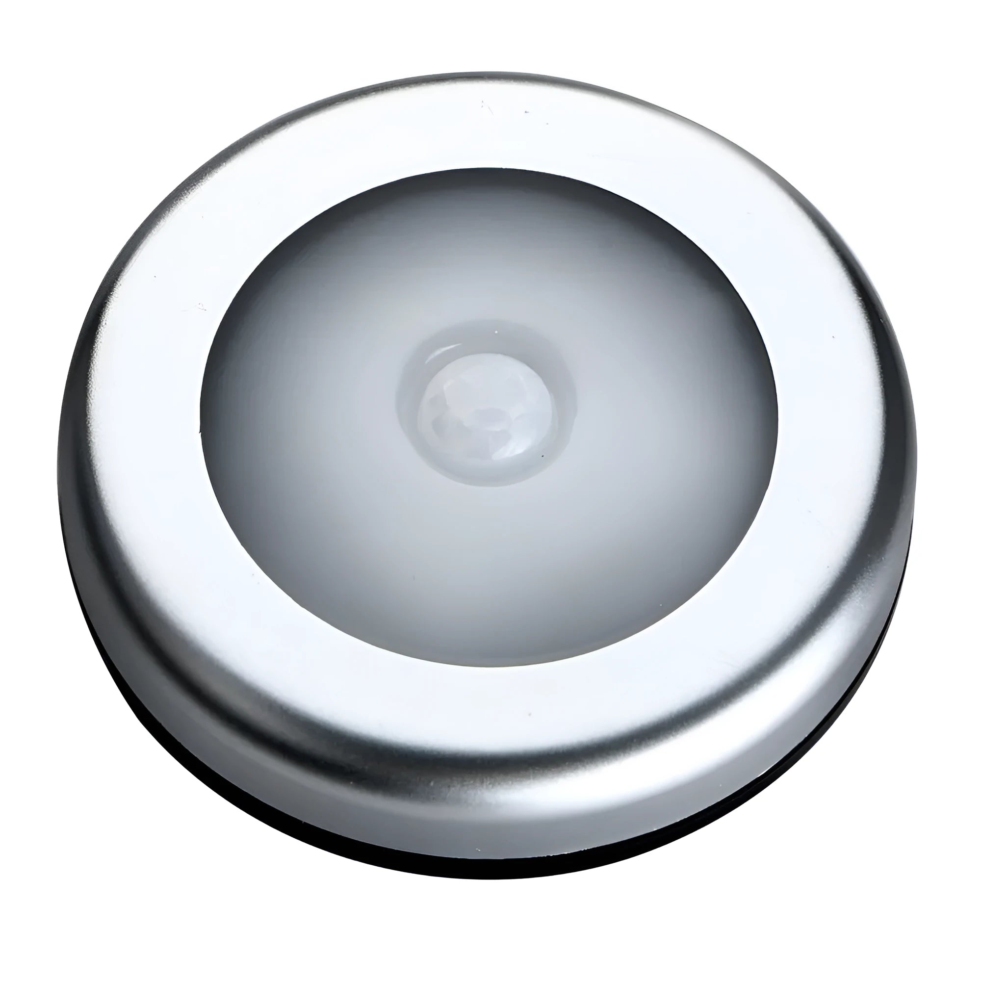 Silver coloured circular wireless motion sensor night light on a wall.