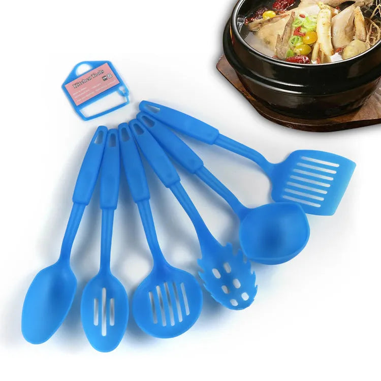 Black rubber kitchen utensil set showing a solid spoon and a slotted spoon for non-stick pans.