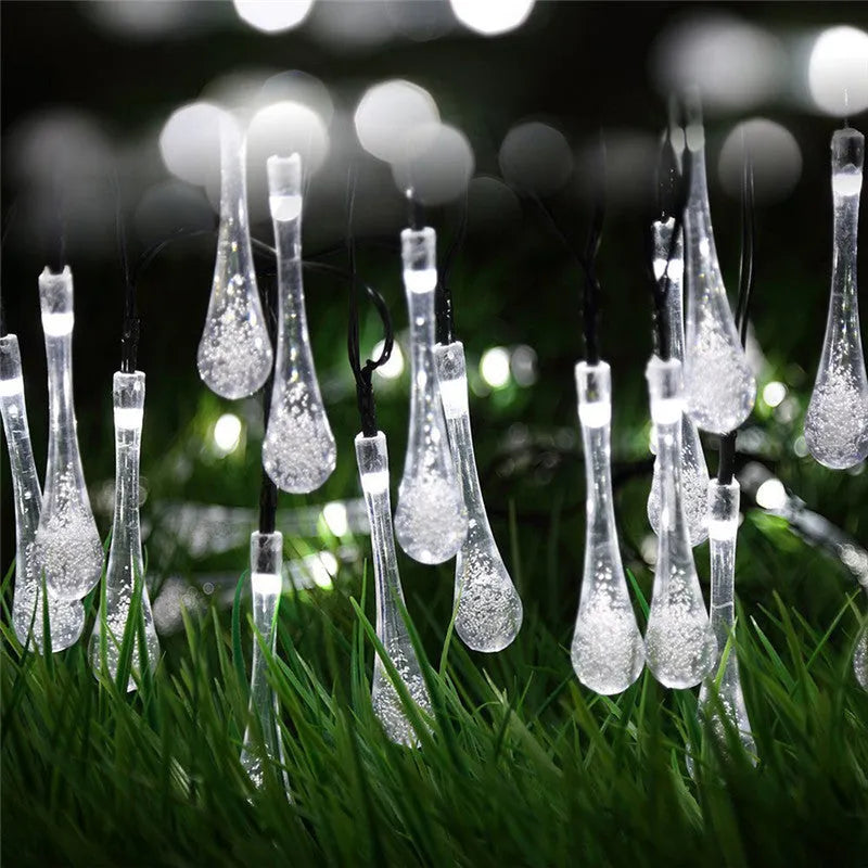 Solar-powered outdoor LED string lights with bubble drop pendants on a 6.5 metre cable.