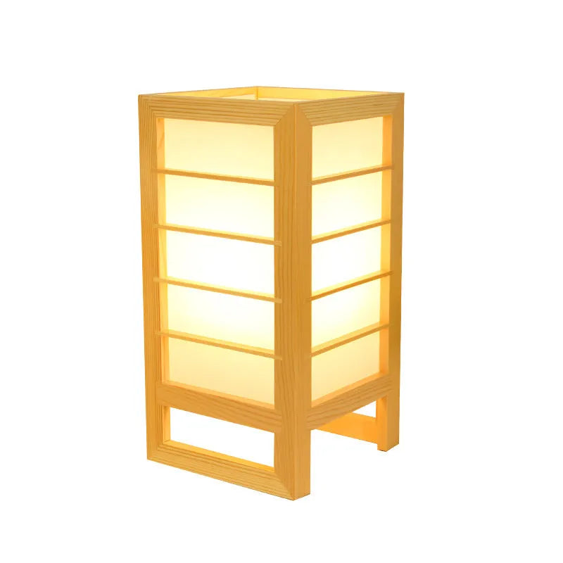 Solid bamboo wood Korean style tatami bedside table lamp on a wooden surface.