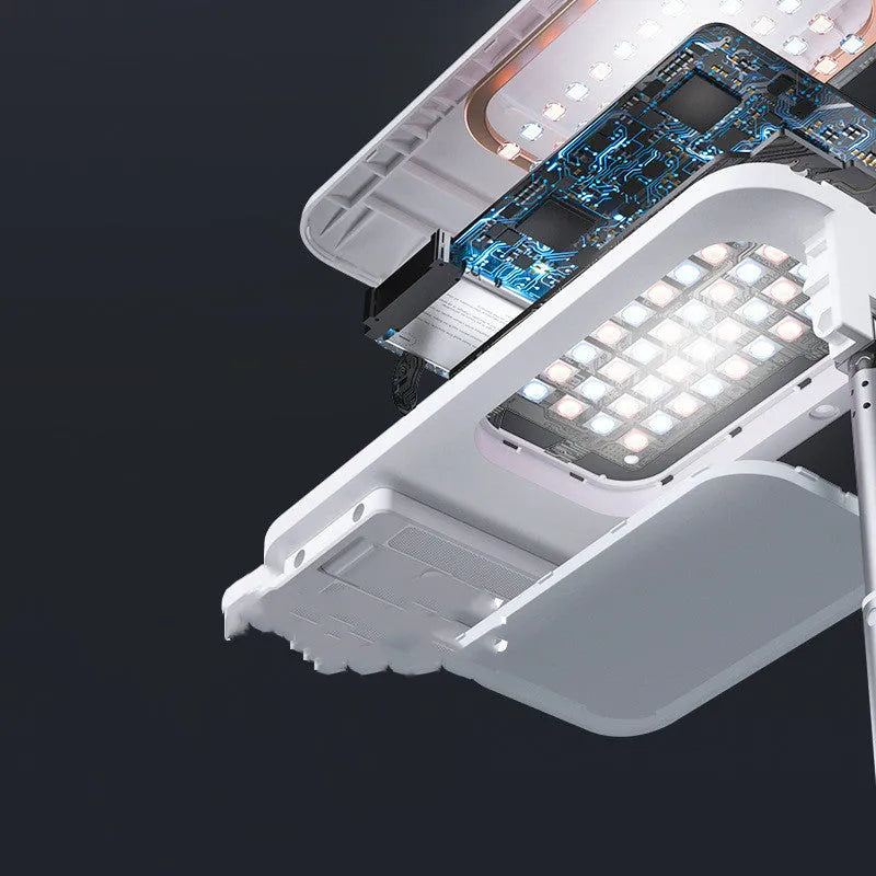 White wireless retractable fill light bracket for smartphone on a desk with LED lighting