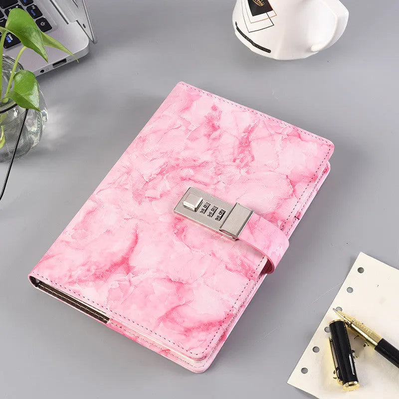 A5 lockable password notebook in blue with a combination lock on the cover, open to show white pages.