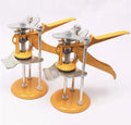 Metal alloy tile raising locator positioner with adjustable height mechanism on a work surface.