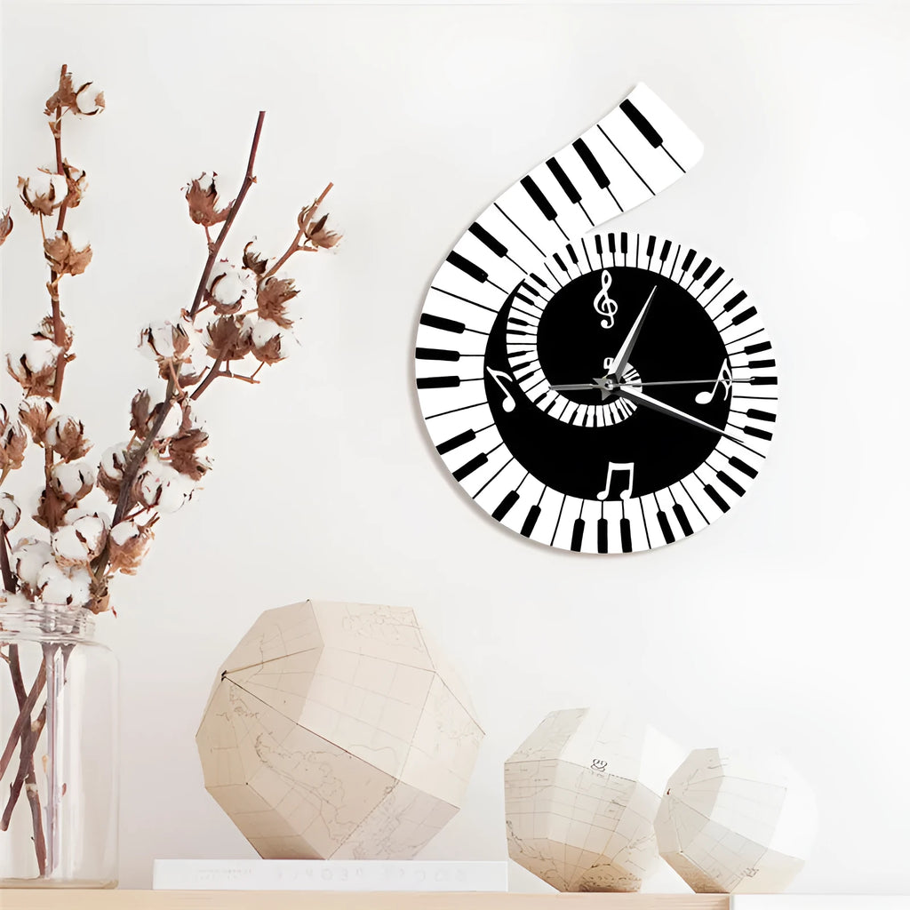 Black and white irregular-shaped wall clock with treble clef and piano keyboard notes design.